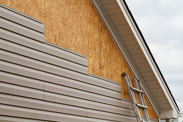 Professional Emergency Siding Repair technician working in Millersburg, PA
